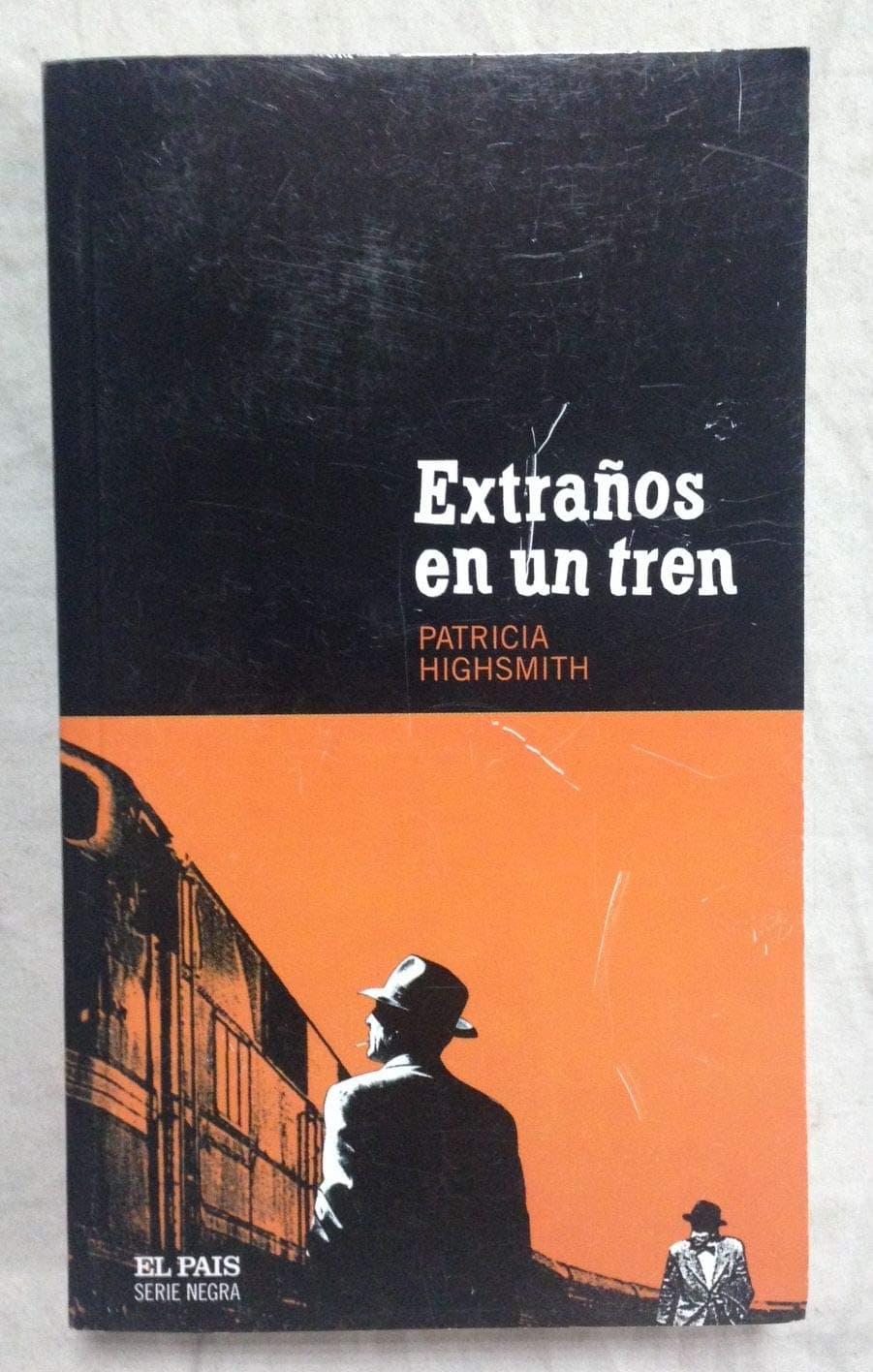 Portada de Extraños en un tren